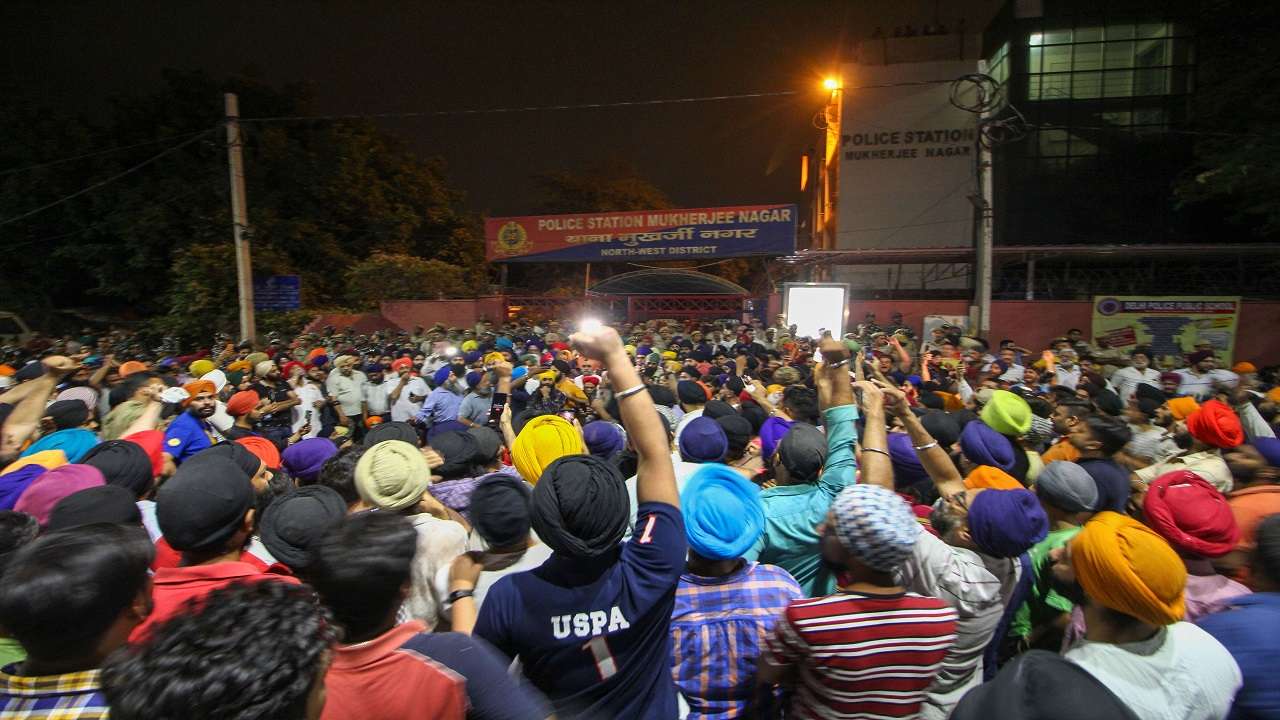 People protest outside Mukherjee Nagar police station demanding sacking of Delhi cops