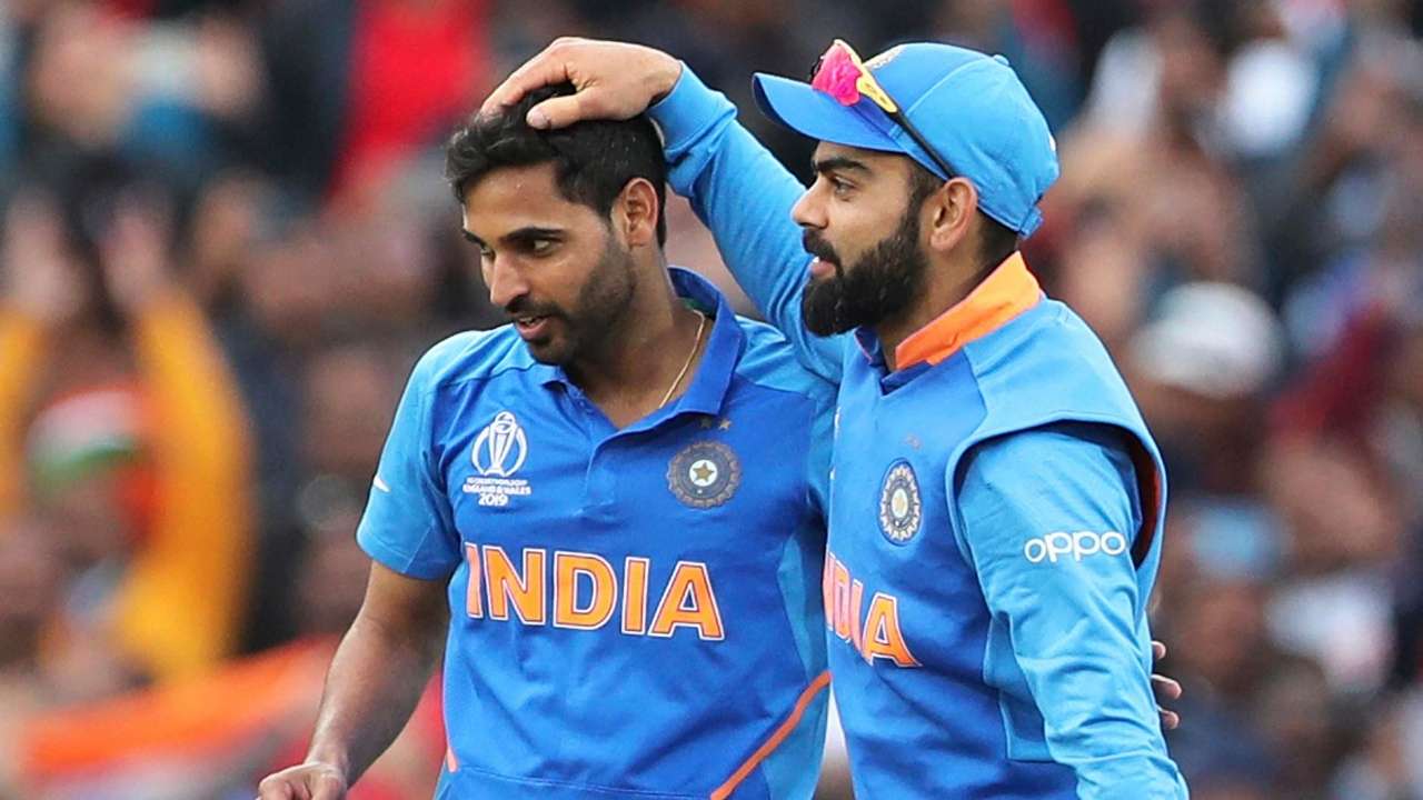 Bhuvneshwar Kumar and Virat Kohli celebrate