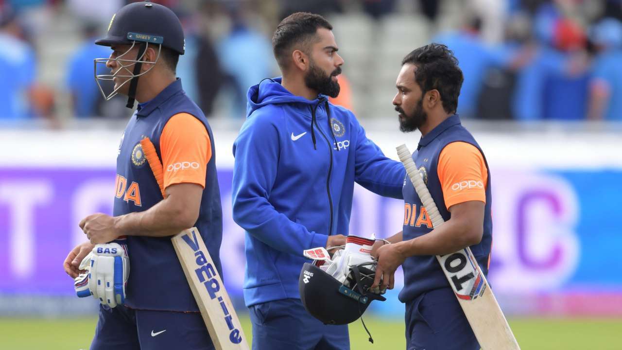 Kohli with Kedar and Dhoni after the match