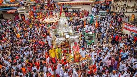 Devotees pull the chariot of Lord Jagannath in Udaipur