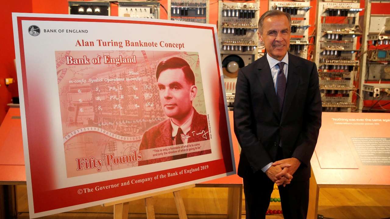 Bank of England governor Mark Carney presents the image of mathematician Alan Turing who will appear on a new 50 pound note 