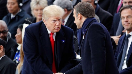 US President Trump, French President Macron shake hands