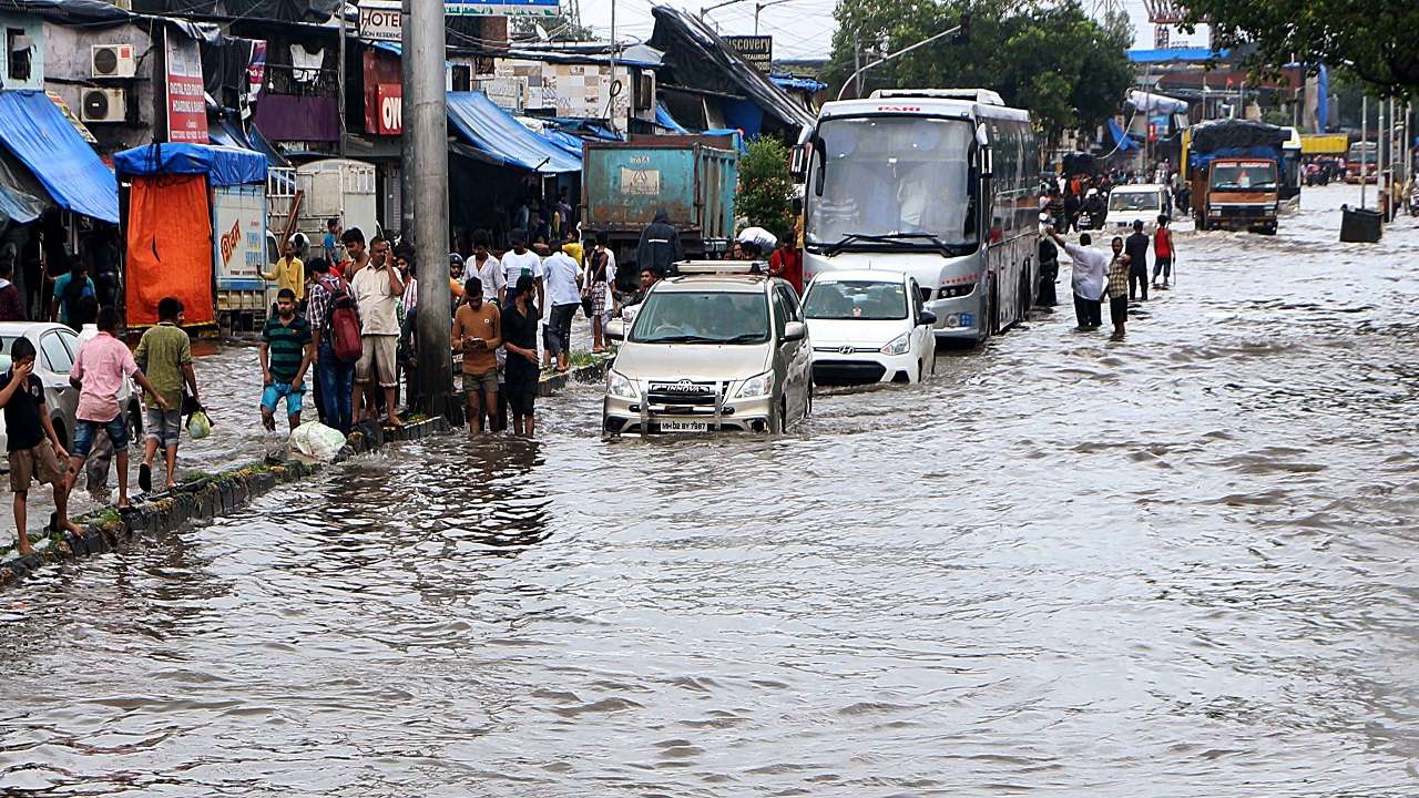 Mumbai: Intense spells of rain to continue, central railway services ...