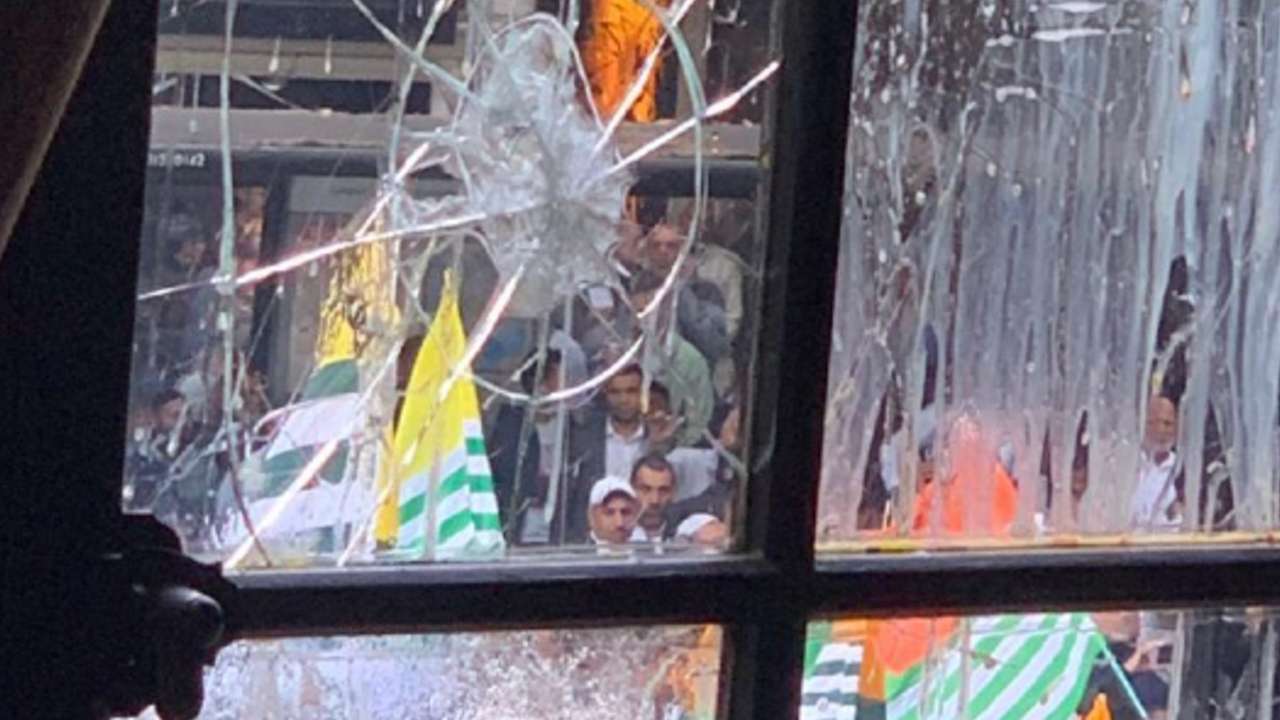 The shattered windowpane of the Indian High Commission in London 