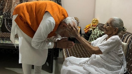 Modi seeks mother's blessings on 69th birthday