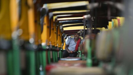 Auto-rickshaw driver sits idle on transport strike day