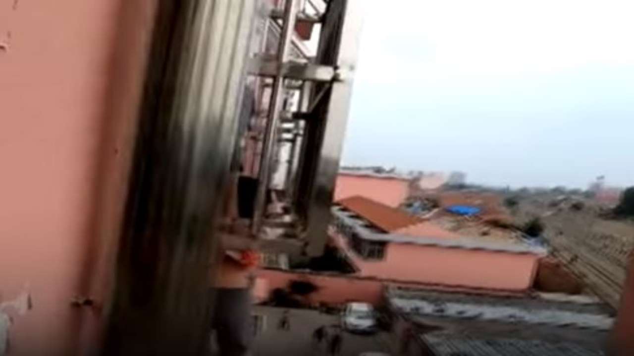 Viral video: This is NOT a piece of cloth but boy hanging from fourth floor balcony