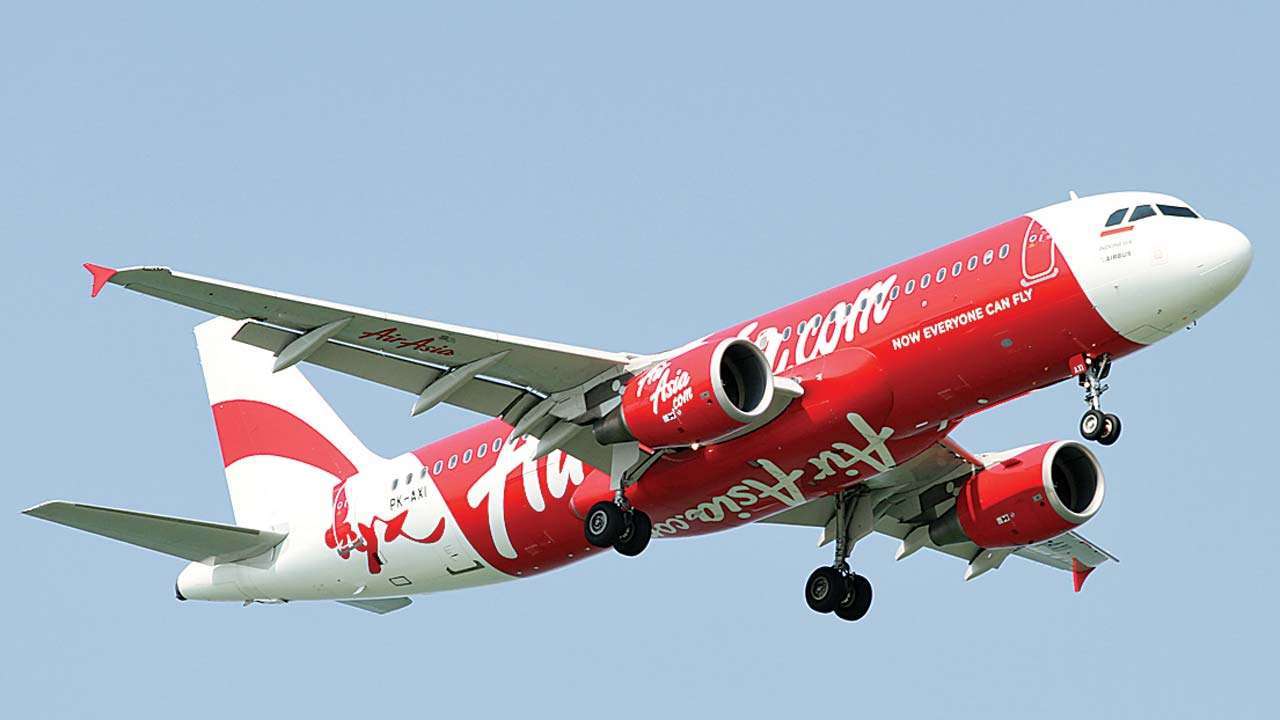 Kolkata-mumbai air asia flight turns back after passenger's bomb threat