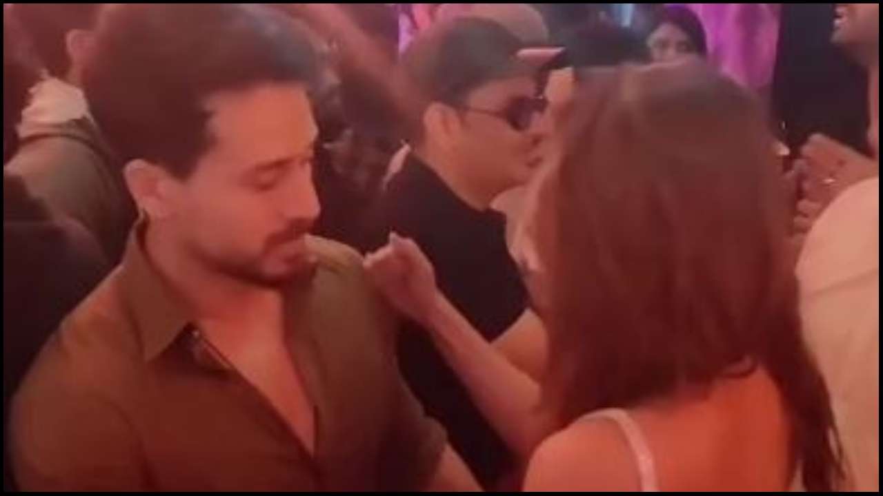 Tiger Shroff CAUGHT checking out Disha Patani at 'Malang' screening