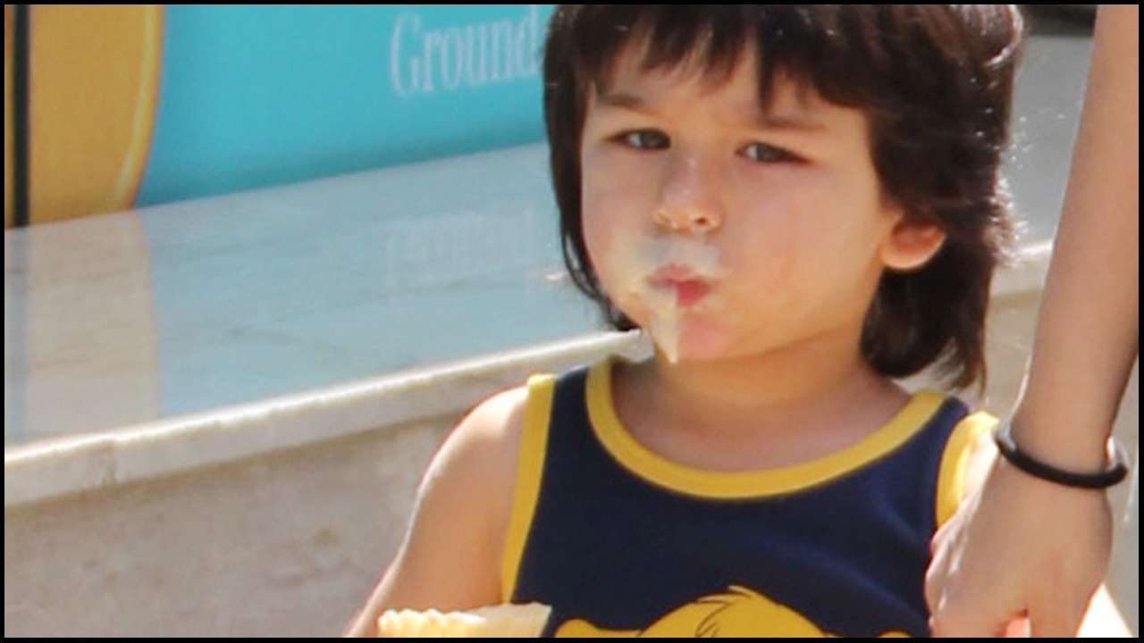 Video: Taimur Ali Khan covers his face in ice-cream
