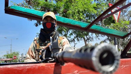 A CRPF trooper stands guard during 13th day of lockdown in Srinagar