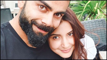 Spotted: Anushka Sharma cozies up to Virat Kohli as they soak in Mumbai weather from their balcony