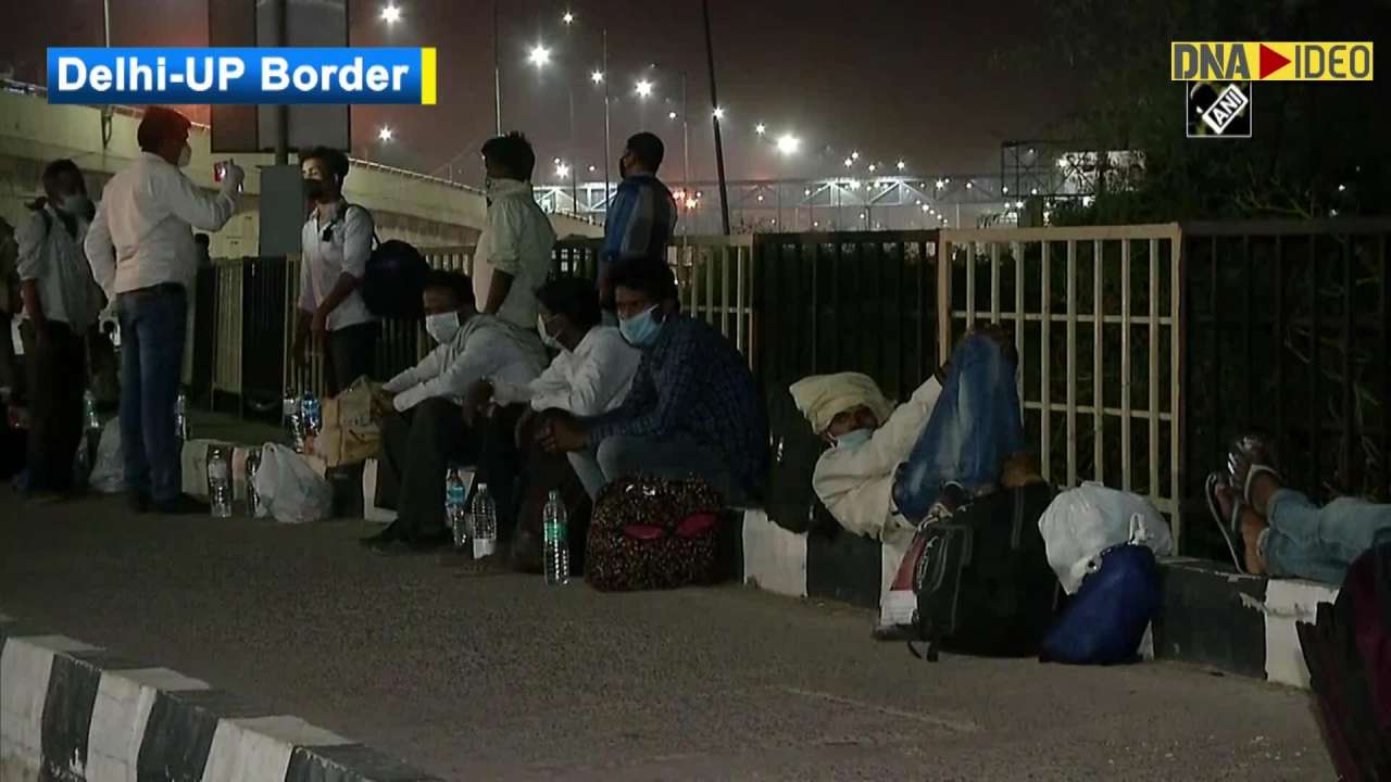 Migrant workers gather at Delhi-UP border to reach their homes amid ...
