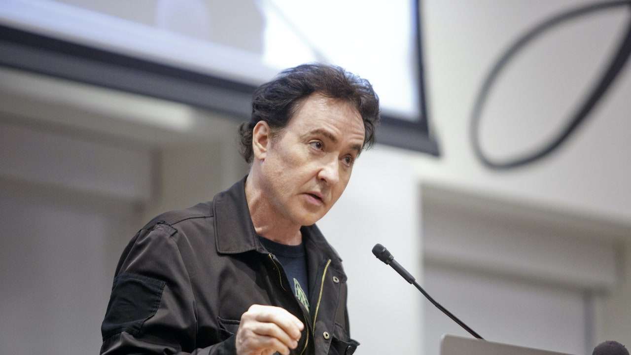 John Cusack shares video of cop who allegedly attacked actor during Chicago protest