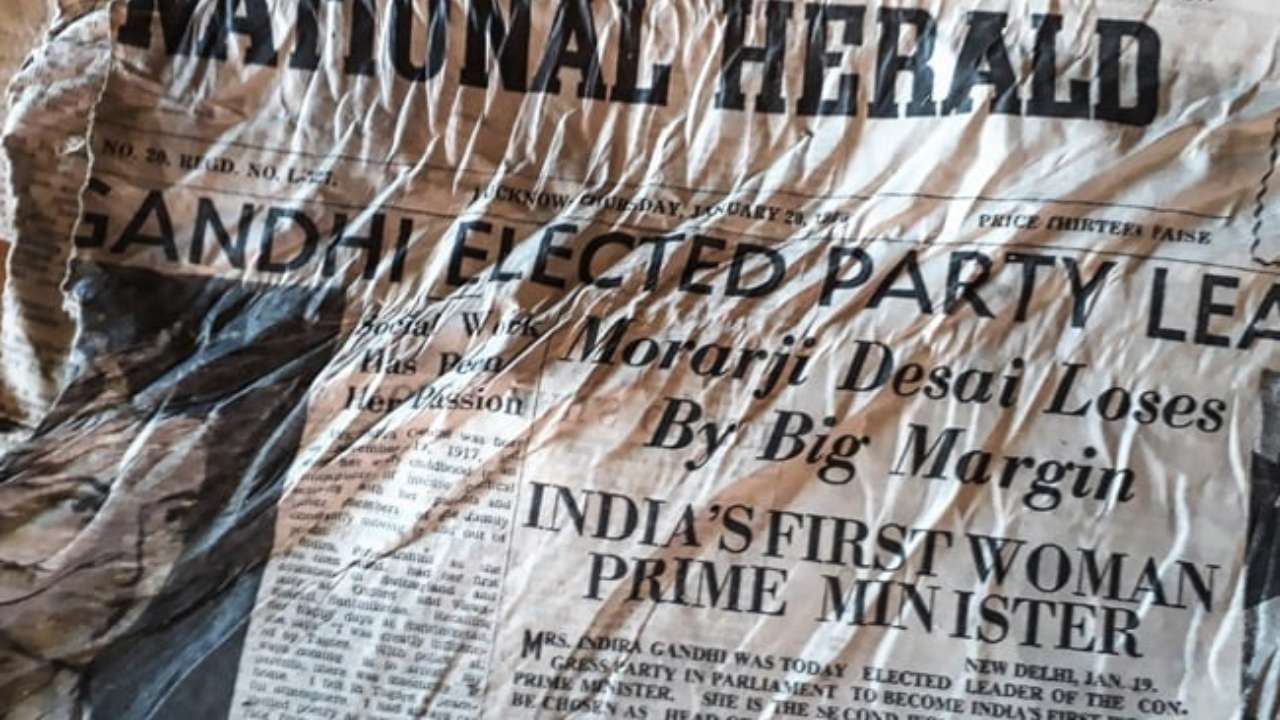 The newspapers carry headlines such as 