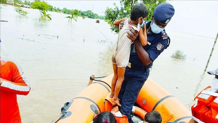 NDRF personnel rescue people from flood-affected villages in Supaul