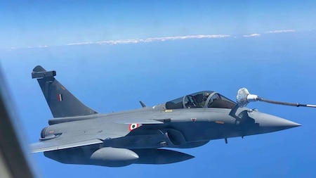 Rafales accompanied by refuelling planes of French Air Force