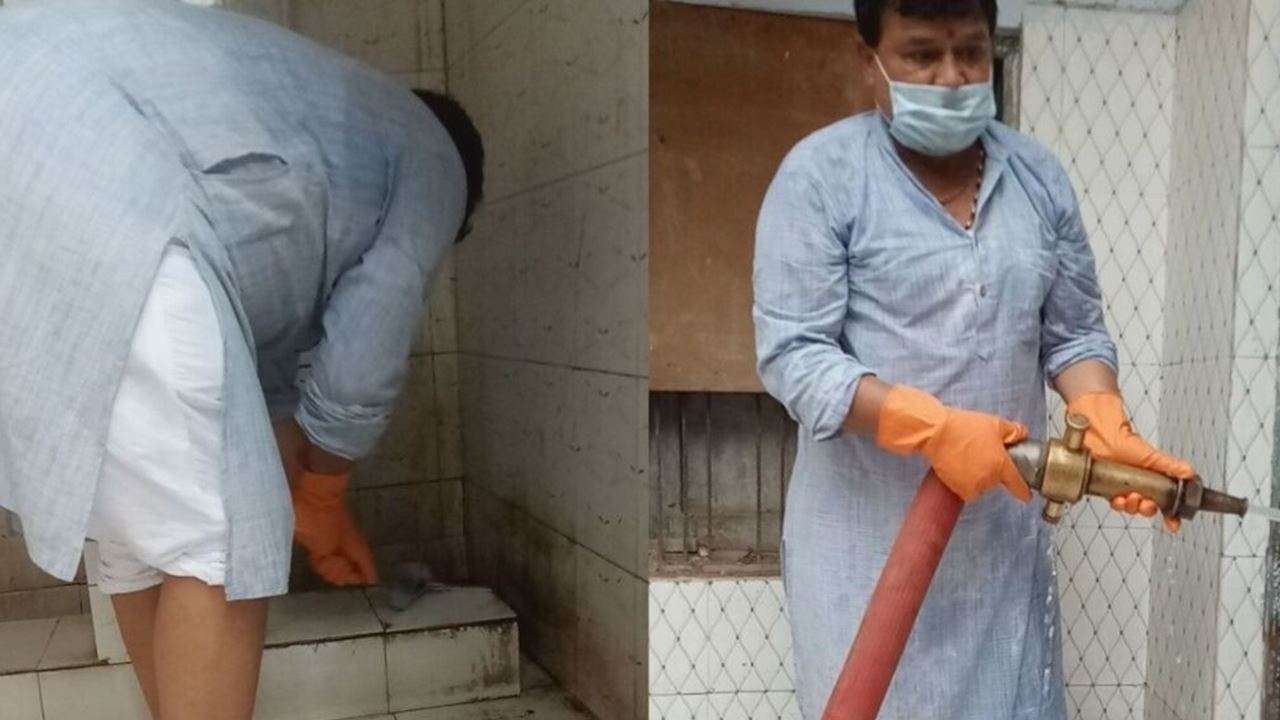 MP Minister cleans women's toilet