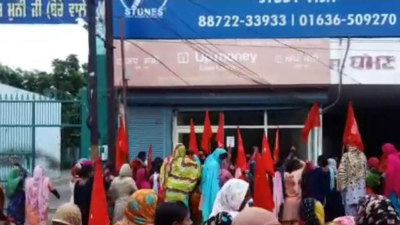 Women in Moga protesting outside a microfinance company