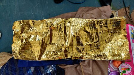 Gold foil recovered from unaccompanied baggage