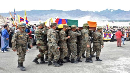 Indian army soldiers carry Tenzin Nyima's coffin