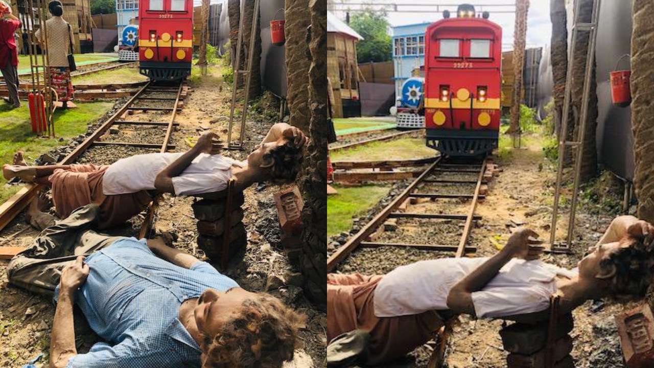 Migrant workers sleeping on railway tracks