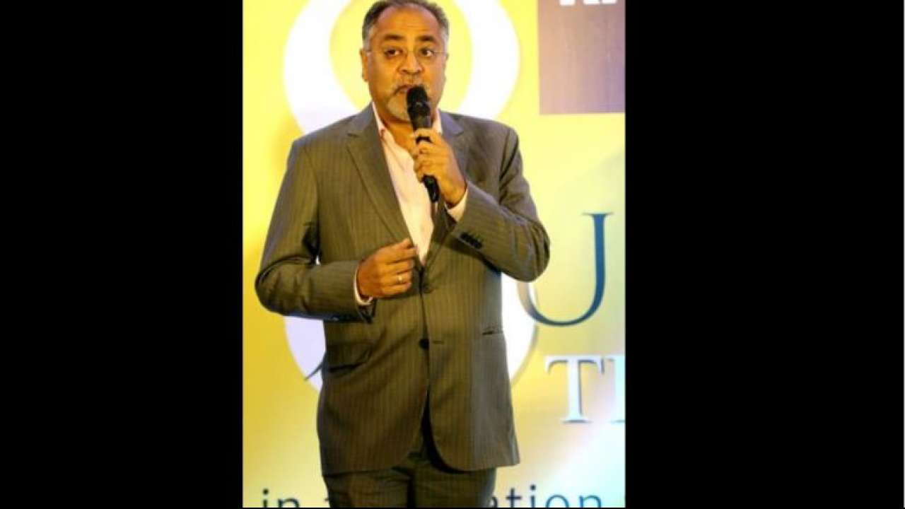 Lal Bhatia and his team install sanitary napkin vending machines in schools & colleges of West Bengal