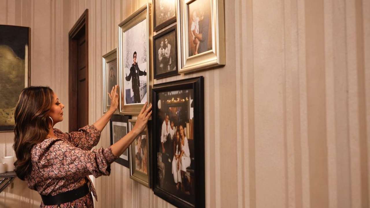 Gauri Khan arranges the photo wall systematically