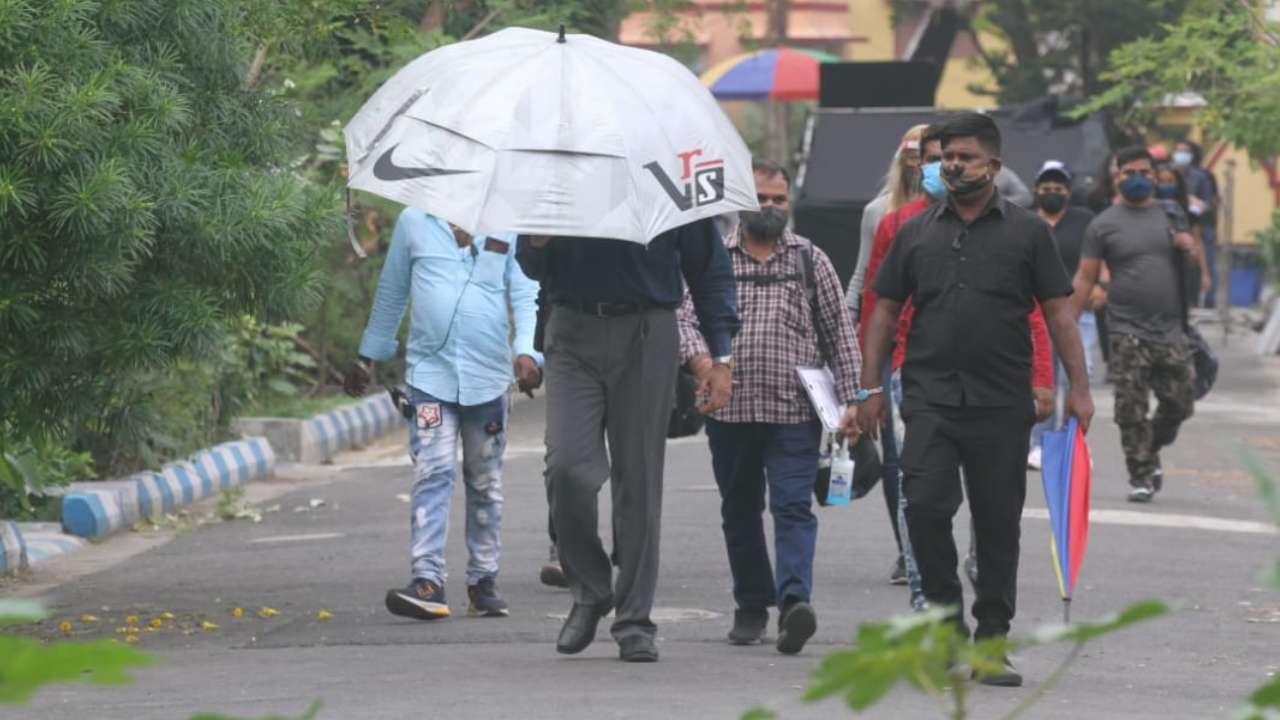 Abhishek Bachchan initially covers his look