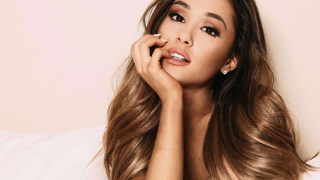 Positions Singer Ariana Grande Teases Mystery Project With Netflix