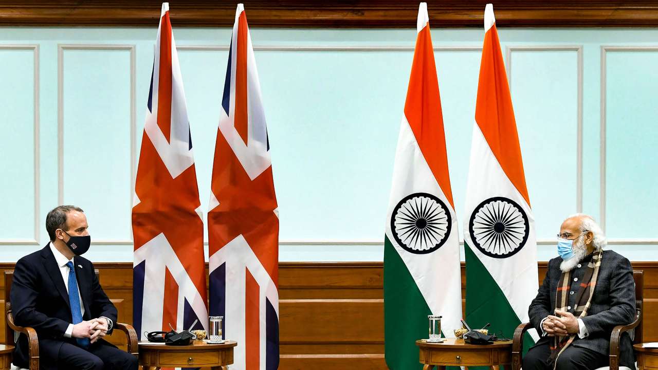 PM Modi and Dominic Raab