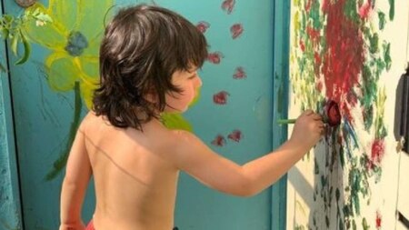 Taimur Ali Khan learns how to paint 'on the wall'
