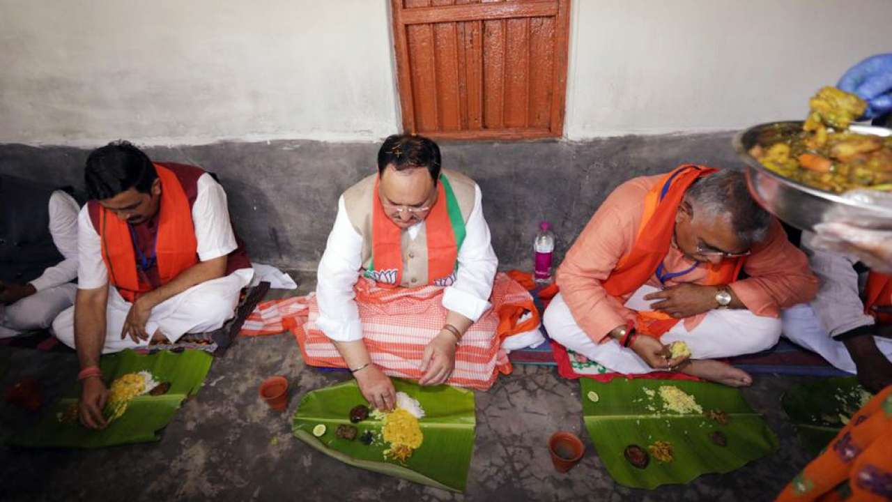 BJP President JP Nadda has food at a farmer's house.