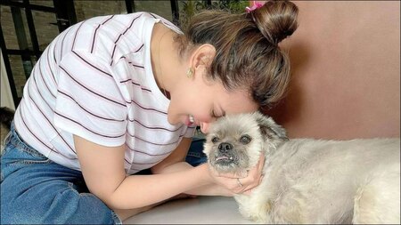 Esha Deol snuggles with her cute pet canine