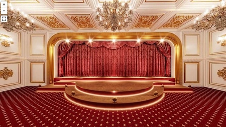 Theatre with red curtains and a golden ceiling