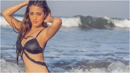 Riya Sen is a 'water baby' as she rocks a black bikini on a beach