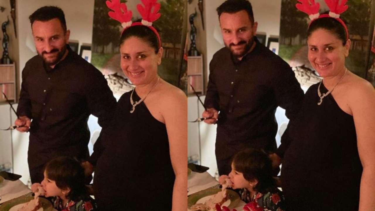 Kareena Kapoor Khan-Saif Ali Khan pose for the camera as Taimur Ali Khan gorges on turkey