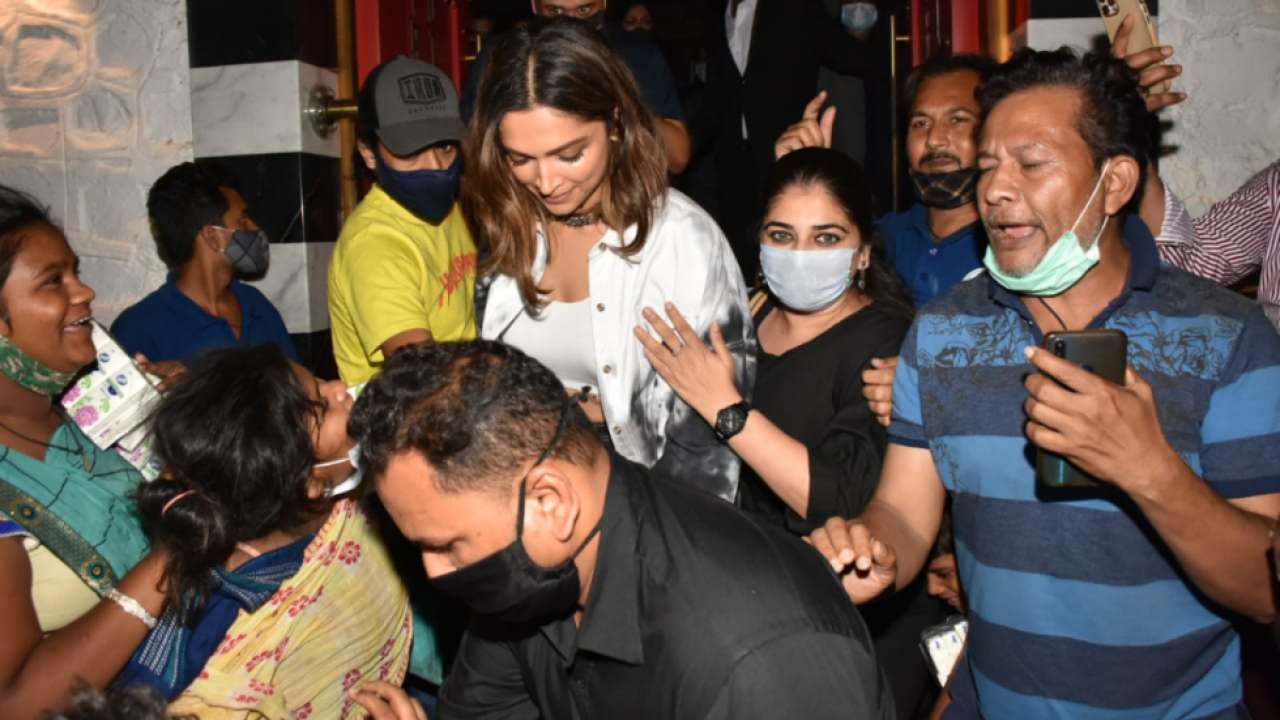 Video: Deepika Padukone struggles to get into her car as woman tries to pull her bag