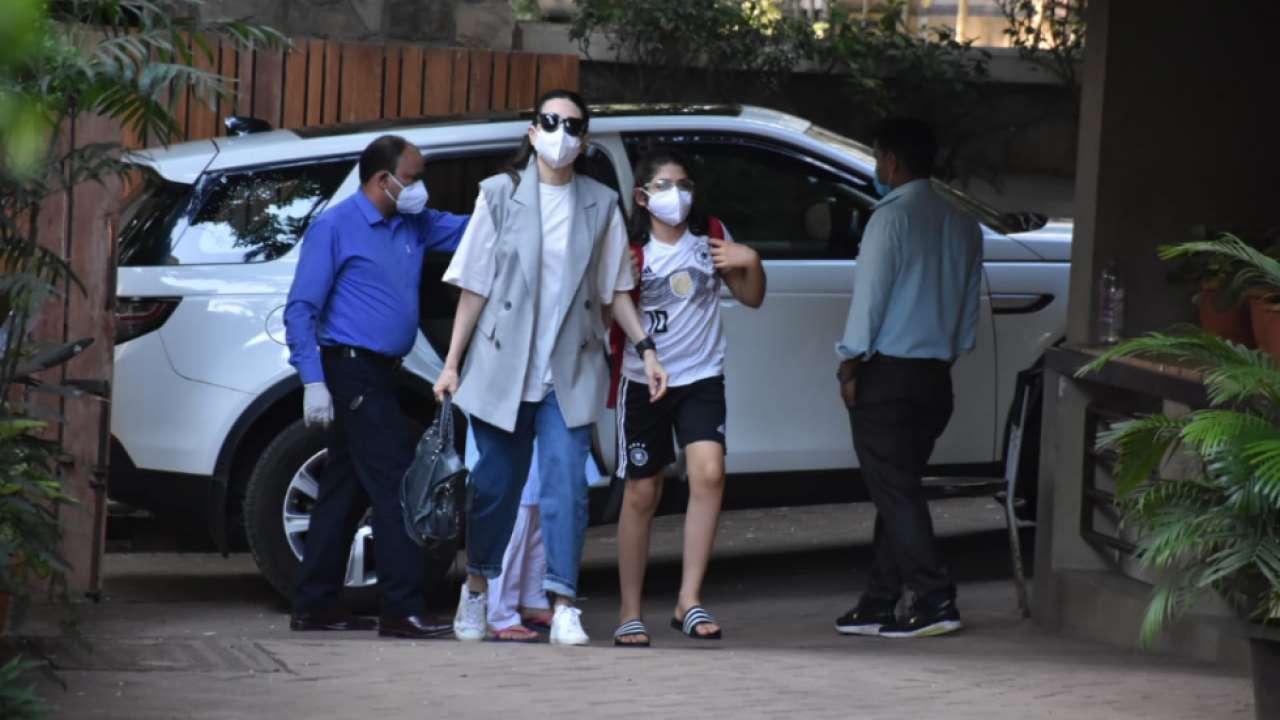 Karisma Kapoor arrives with son Kiaan