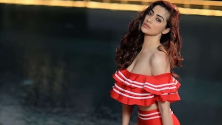 Raai Laxmi poses in red hot bikini