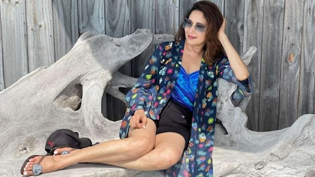 Madhuri Dixit matches her outfit with the ocean while holidaying in the Maldives