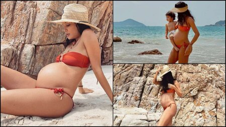 Lisa Haydon flaunts her summer body in an orange bikini