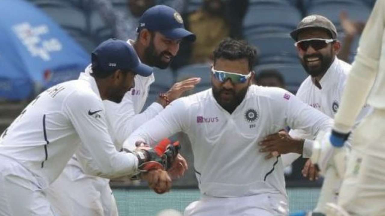 Teammates lifting Rohit Sharma