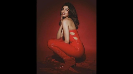 Khushi Kapoor rocks a hot red swimsuit with pants