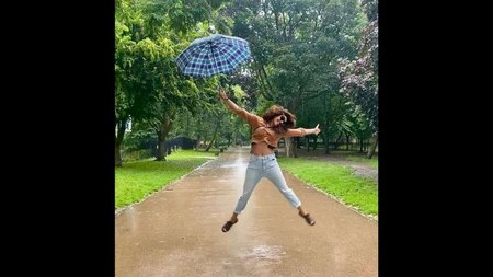 Priyanka Chopra having a fun moment in the rain