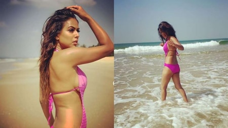 Nia Sharma flaunts curves in hot pink monokini