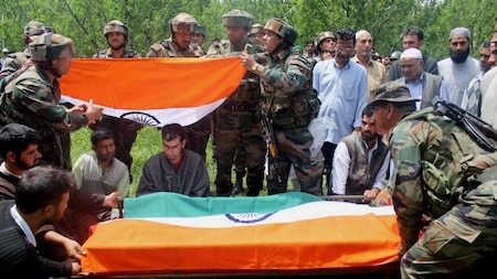 Indian soldiers put tricolour on martyr Ummer Fayaz's casket