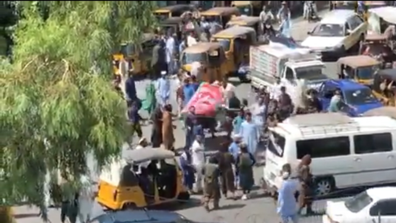 The Taliban fighters opened fire at a group of protesters in Jalalabad waving the national flag