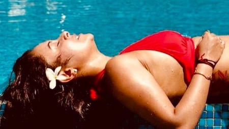 Devoleena Bhattacharjee looks sexy in a red bikini