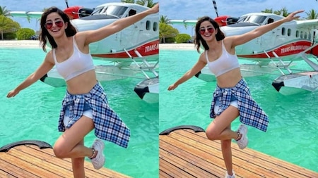 Ananya Panday poses in front of a seaplane
